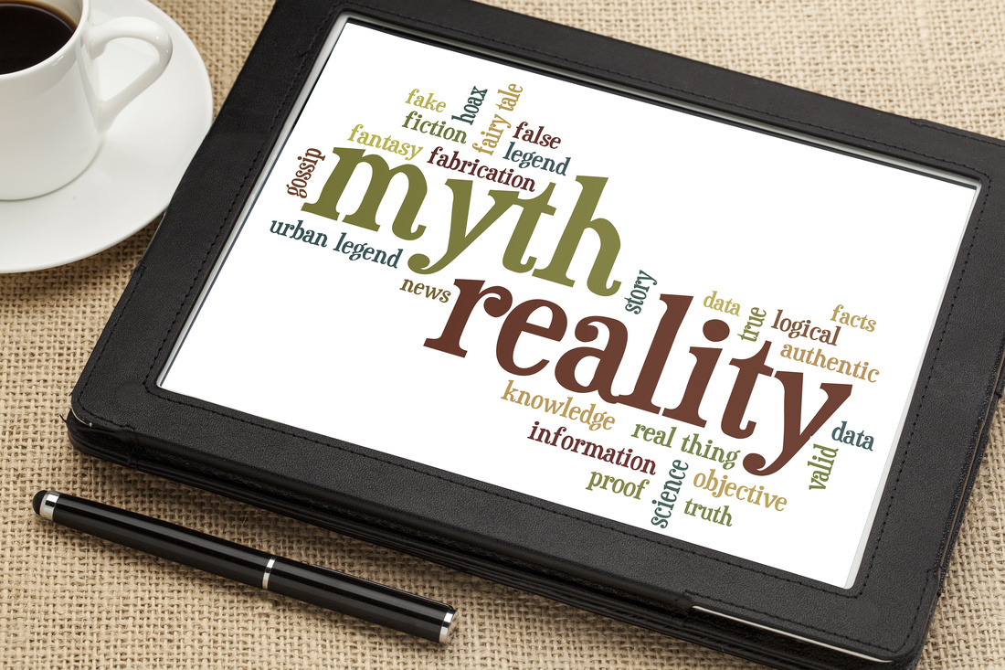 cloud of words or tags related to myth and reality on a  digital tablet